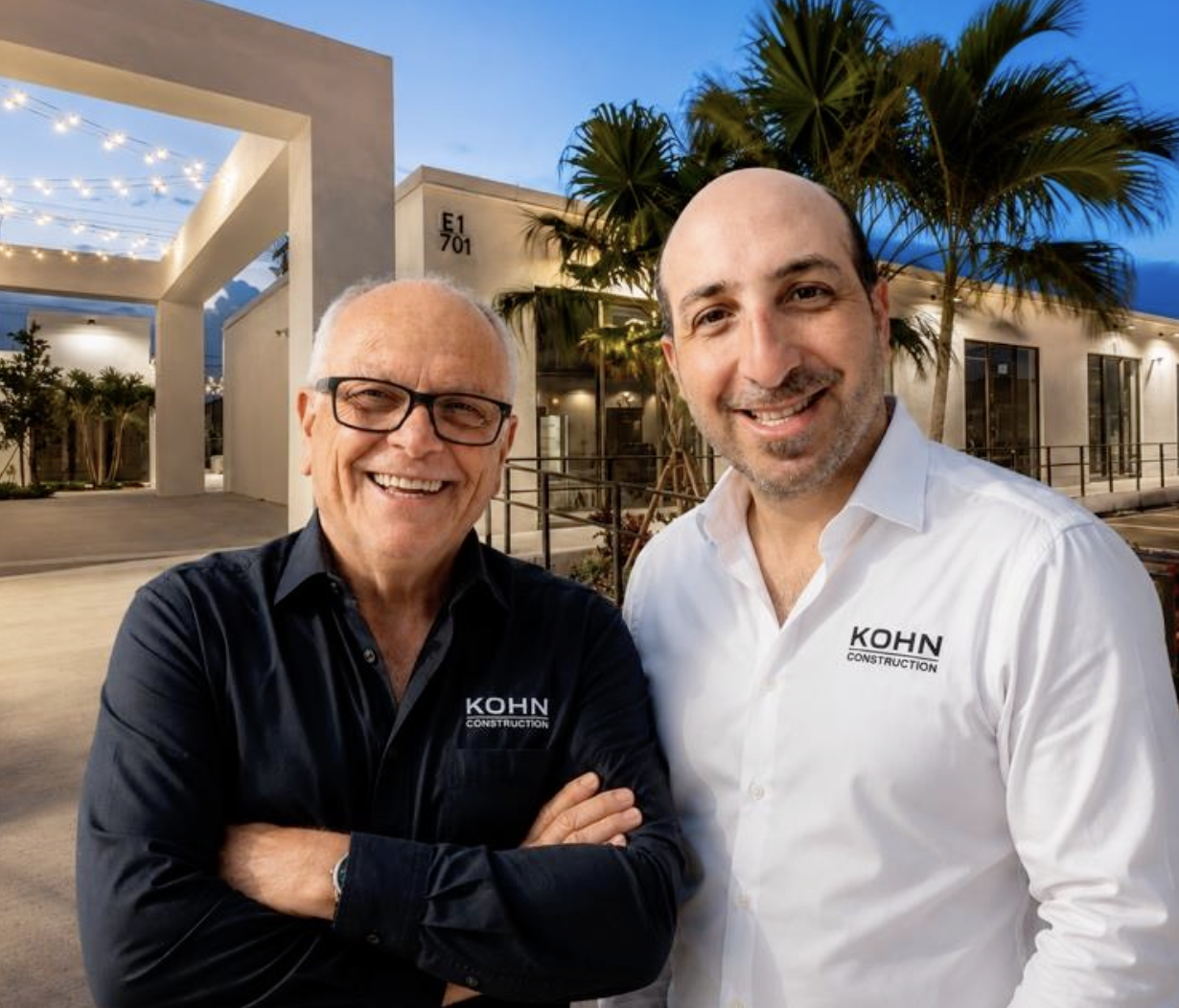 Alberto Kohn and Israel David Kohn outside a Kohn Construction project